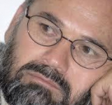 CEO Abdullah Pledges Reassessment of Afghan Photographer's Case